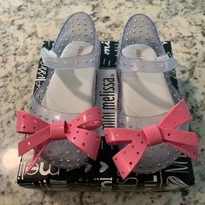 Mini Melissa clear shoes with pink bows - size 9